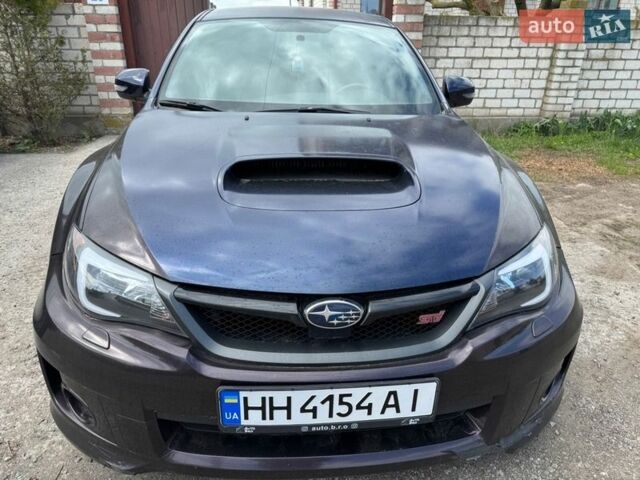 Синий Субару WRX STI, объемом двигателя 2.5 л и пробегом 109 тыс. км за 15000 $, фото 1 на Automoto.ua