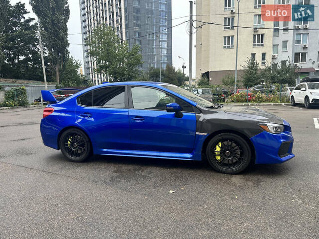 Синий Субару WRX STI, объемом двигателя 2.46 л и пробегом 37 тыс. км за 27000 $, фото 1 на Automoto.ua