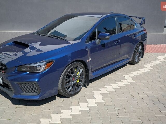 Синий Субару WRX STI, объемом двигателя 2.46 л и пробегом 129 тыс. км за 25000 $, фото 1 на Automoto.ua