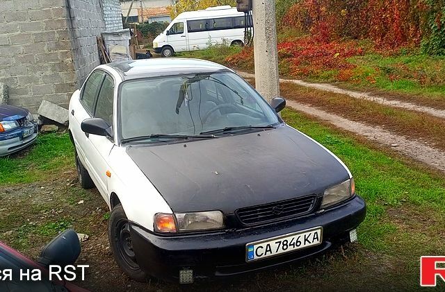 Белый Сузуки Балеро, объемом двигателя 1.3 л и пробегом 222 тыс. км за 1000 $, фото 1 на Automoto.ua