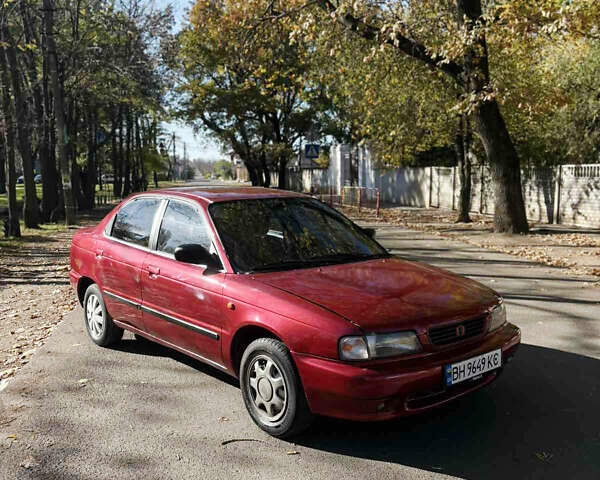 Красный Сузуки Балеро, объемом двигателя 1.6 л и пробегом 378 тыс. км за 1550 $, фото 1 на Automoto.ua