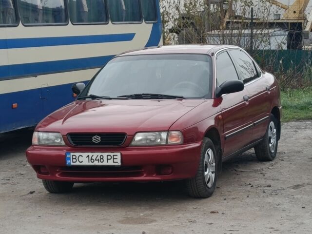Красный Сузуки Балеро, объемом двигателя 1.6 л и пробегом 297 тыс. км за 2400 $, фото 1 на Automoto.ua