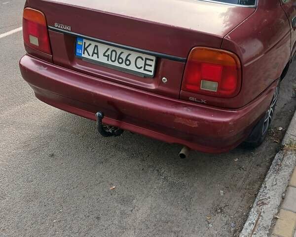 Красный Сузуки Балеро, объемом двигателя 1.59 л и пробегом 320 тыс. км за 2100 $, фото 1 на Automoto.ua