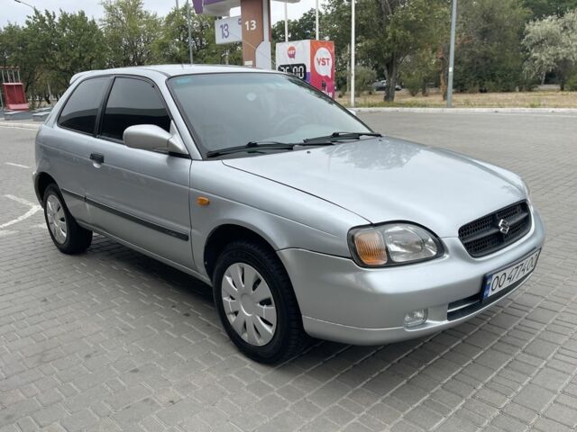 Серый Сузуки Балеро, объемом двигателя 1.3 л и пробегом 212 тыс. км за 2400 $, фото 1 на Automoto.ua