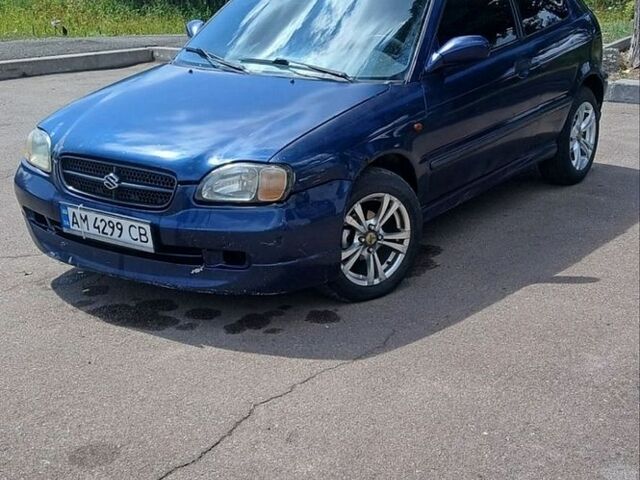 Синий Сузуки Балеро, объемом двигателя 1.3 л и пробегом 319 тыс. км за 1100 $, фото 1 на Automoto.ua