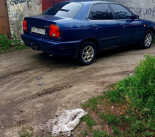 Синий Сузуки Балеро, объемом двигателя 1.3 л и пробегом 300 тыс. км за 1200 $, фото 1 на Automoto.ua