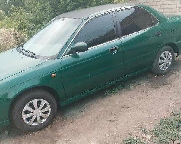 Зеленый Сузуки Балеро, объемом двигателя 1.3 л и пробегом 80 тыс. км за 1806 $, фото 1 на Automoto.ua