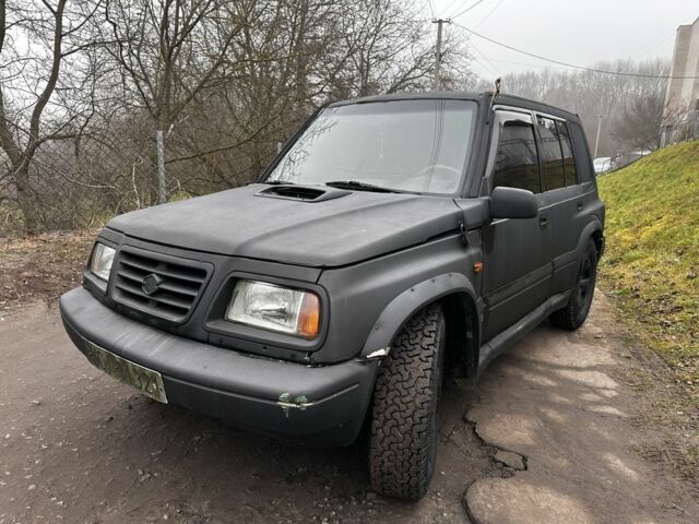 Черный Сузуки Гранд Витара, объемом двигателя 2 л и пробегом 300 тыс. км за 1850 $, фото 1 на Automoto.ua