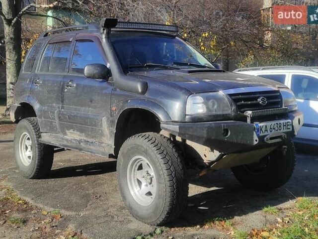 Черный Сузуки Гранд Витара, объемом двигателя 2 л и пробегом 270 тыс. км за 7500 $, фото 1 на Automoto.ua
