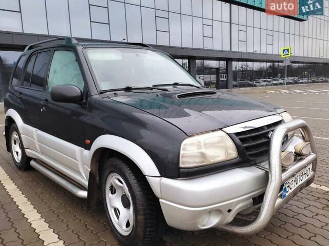 Черный Сузуки Гранд Витара, объемом двигателя 2 л и пробегом 299 тыс. км за 5600 $, фото 1 на Automoto.ua