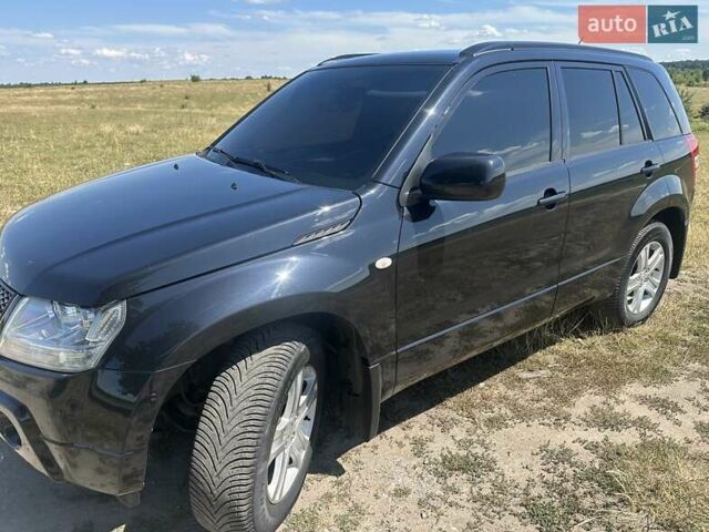 Черный Сузуки Гранд Витара, объемом двигателя 2 л и пробегом 172 тыс. км за 6950 $, фото 1 на Automoto.ua