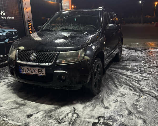 Черный Сузуки Гранд Витара, объемом двигателя 2 л и пробегом 177 тыс. км за 6600 $, фото 1 на Automoto.ua