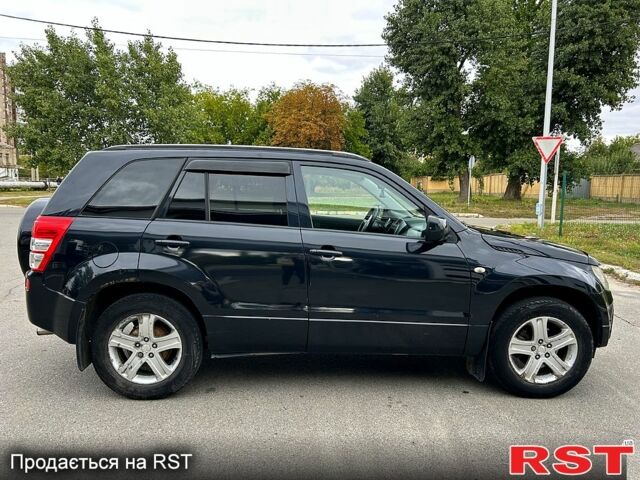 Черный Сузуки Гранд Витара, объемом двигателя 2 л и пробегом 170 тыс. км за 6900 $, фото 1 на Automoto.ua