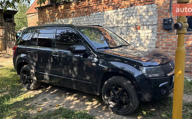 Черный Сузуки Гранд Витара, объемом двигателя 1.87 л и пробегом 260 тыс. км за 7500 $, фото 1 на Automoto.ua