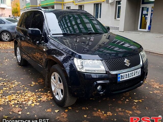 Черный Сузуки Гранд Витара, объемом двигателя 2 л и пробегом 235 тыс. км за 7500 $, фото 1 на Automoto.ua