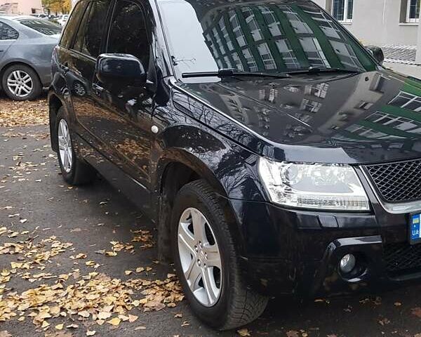 Черный Сузуки Гранд Витара, объемом двигателя 2 л и пробегом 235 тыс. км за 7300 $, фото 1 на Automoto.ua