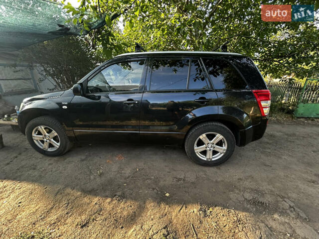 Черный Сузуки Гранд Витара, объемом двигателя 1.9 л и пробегом 240 тыс. км за 6200 $, фото 1 на Automoto.ua