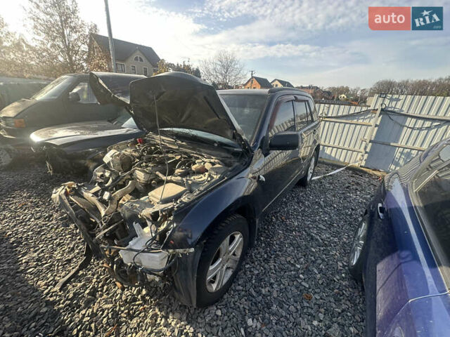 Черный Сузуки Гранд Витара, объемом двигателя 2 л и пробегом 240 тыс. км за 2900 $, фото 1 на Automoto.ua