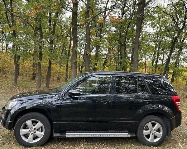 Чорний Сузукі Гранд Вітара, об'ємом двигуна 2.39 л та пробігом 176 тис. км за 8600 $, фото 1 на Automoto.ua