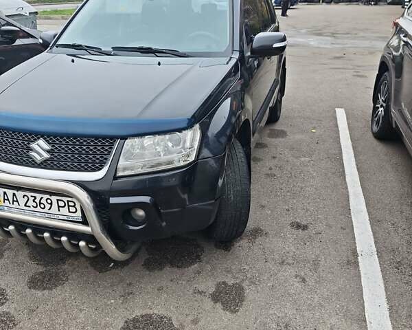 Чорний Сузукі Гранд Вітара, об'ємом двигуна 2.4 л та пробігом 328 тис. км за 9900 $, фото 1 на Automoto.ua