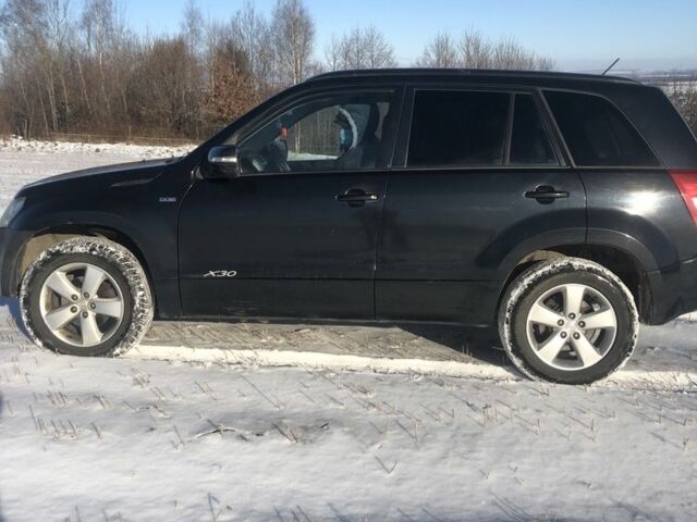 Черный Сузуки Гранд Витара, объемом двигателя 1.9 л и пробегом 270 тыс. км за 8788 $, фото 1 на Automoto.ua
