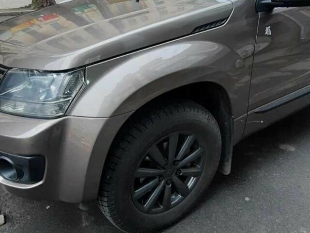 Коричневый Сузуки Гранд Витара, объемом двигателя 2.4 л и пробегом 92 тыс. км за 12700 $, фото 1 на Automoto.ua