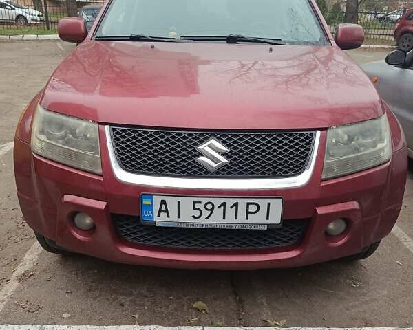 Красный Сузуки Гранд Витара, объемом двигателя 2 л и пробегом 185 тыс. км за 7000 $, фото 1 на Automoto.ua