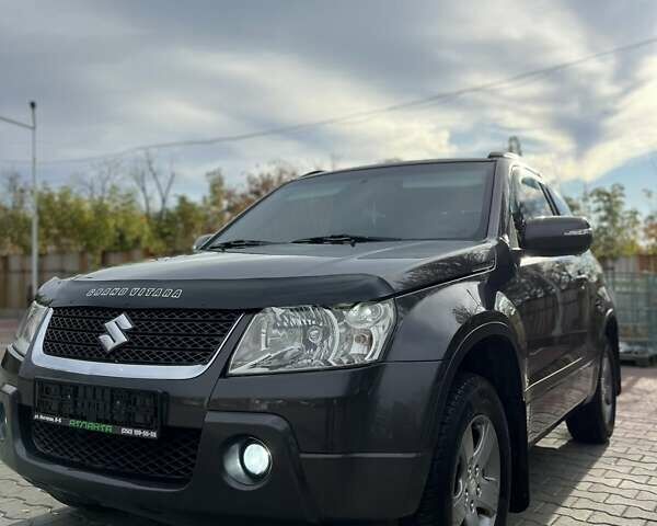 Серый Сузуки Гранд Витара, объемом двигателя 2.4 л и пробегом 200 тыс. км за 7900 $, фото 1 на Automoto.ua