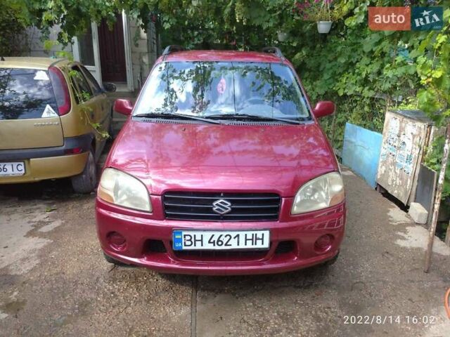 Красный Сузуки Игнис, объемом двигателя 1.33 л и пробегом 320 тыс. км за 1900 $, фото 1 на Automoto.ua