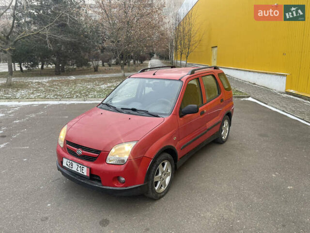 Красный Сузуки Игнис, объемом двигателя 1.5 л и пробегом 200 тыс. км за 1799 $, фото 1 на Automoto.ua