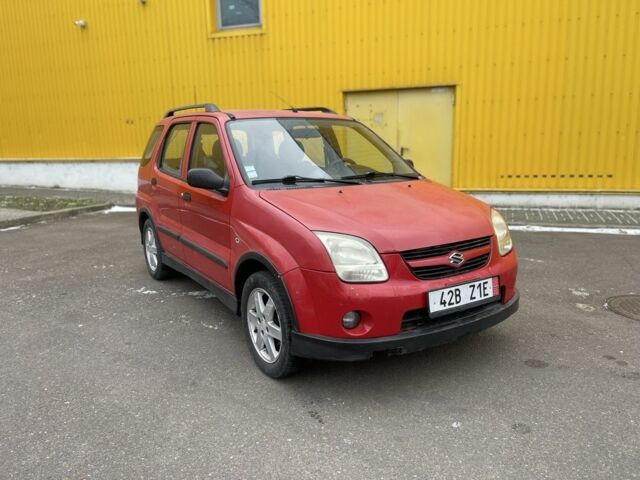 Красный Сузуки Игнис, объемом двигателя 1.5 л и пробегом 200 тыс. км за 1799 $, фото 1 на Automoto.ua