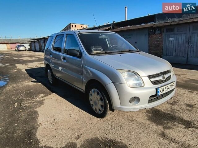 Серый Сузуки Игнис, объемом двигателя 1.3 л и пробегом 186 тыс. км за 4200 $, фото 1 на Automoto.ua