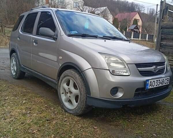 Серый Сузуки Игнис, объемом двигателя 1.25 л и пробегом 383 тыс. км за 4750 $, фото 1 на Automoto.ua