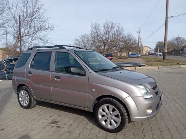 Серый Сузуки Игнис, объемом двигателя 1.5 л и пробегом 279 тыс. км за 5530 $, фото 1 на Automoto.ua