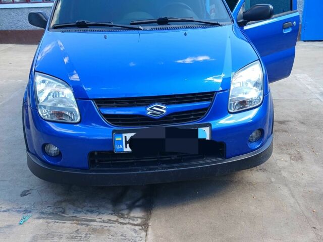 Синий Сузуки Игнис, объемом двигателя 1.3 л и пробегом 240 тыс. км за 5000 $, фото 1 на Automoto.ua