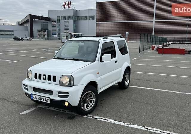 Белый Сузуки Джимни, объемом двигателя 1.3 л и пробегом 81 тыс. км за 9300 $, фото 1 на Automoto.ua