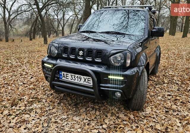 Черный Сузуки Джимни, объемом двигателя 1.33 л и пробегом 148 тыс. км за 8500 $, фото 1 на Automoto.ua