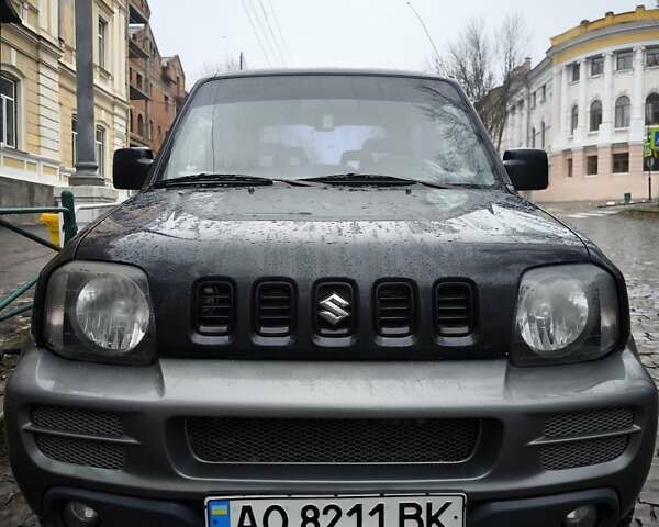 Чорний Сузукі Джімні, об'ємом двигуна 1.3 л та пробігом 164 тис. км за 7450 $, фото 1 на Automoto.ua