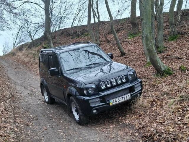Черный Сузуки Джимни, объемом двигателя 1.3 л и пробегом 225 тыс. км за 6500 $, фото 1 на Automoto.ua