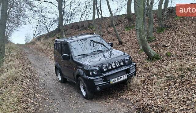Черный Сузуки Джимни, объемом двигателя 1.3 л и пробегом 225 тыс. км за 6500 $, фото 1 на Automoto.ua