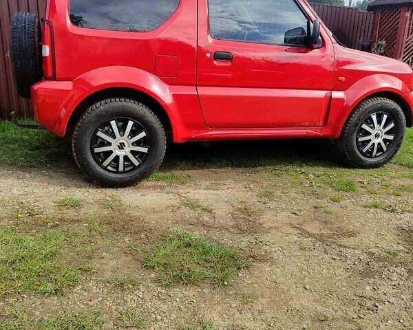 Червоний Сузукі Джімні, об'ємом двигуна 1.3 л та пробігом 205 тис. км за 5400 $, фото 1 на Automoto.ua
