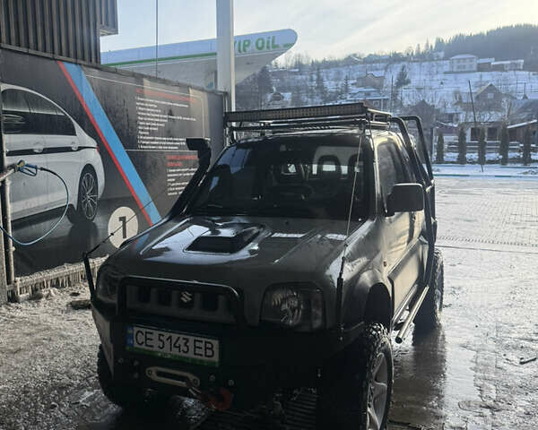 Сірий Сузукі Джімні, об'ємом двигуна 1.46 л та пробігом 117 тис. км за 13000 $, фото 1 на Automoto.ua