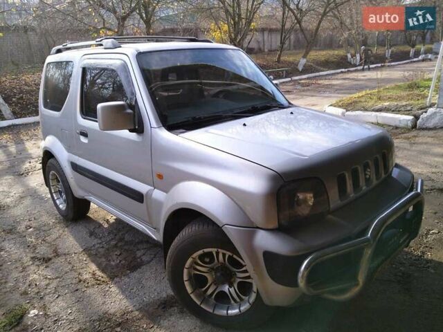Серый Сузуки Джимни, объемом двигателя 1.3 л и пробегом 73 тыс. км за 11500 $, фото 1 на Automoto.ua