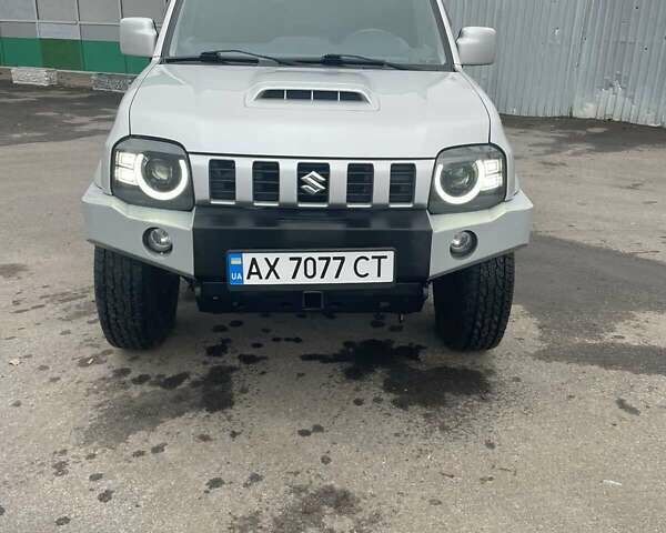 Серый Сузуки Джимни, объемом двигателя 1.3 л и пробегом 68 тыс. км за 16900 $, фото 1 на Automoto.ua