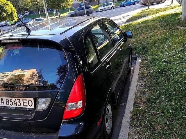 Черный Сузуки Лиана, объемом двигателя 2 л и пробегом 290 тыс. км за 3200 $, фото 1 на Automoto.ua