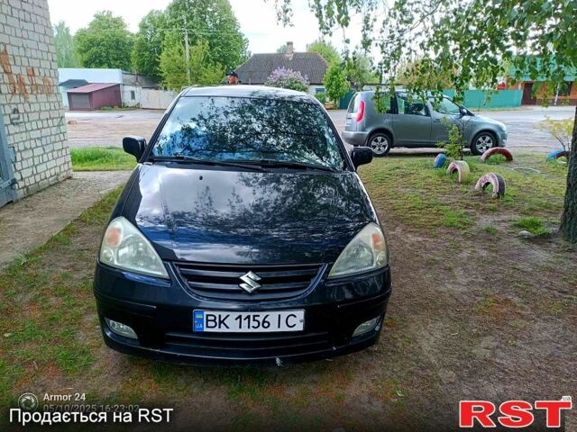 Черный Сузуки Лиана, объемом двигателя 1.6 л и пробегом 150 тыс. км за 5000 $, фото 1 на Automoto.ua