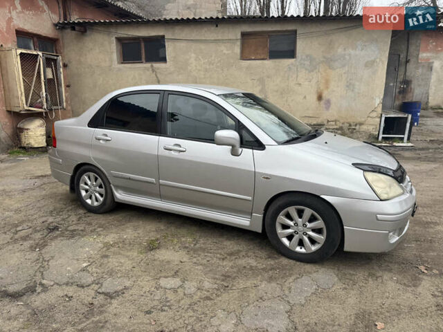 Серый Сузуки Лиана, объемом двигателя 1.6 л и пробегом 186 тыс. км за 4790 $, фото 1 на Automoto.ua
