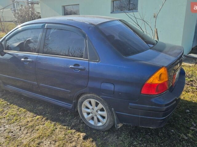 Синий Сузуки Лиана, объемом двигателя 1.6 л и пробегом 204 тыс. км за 3800 $, фото 1 на Automoto.ua