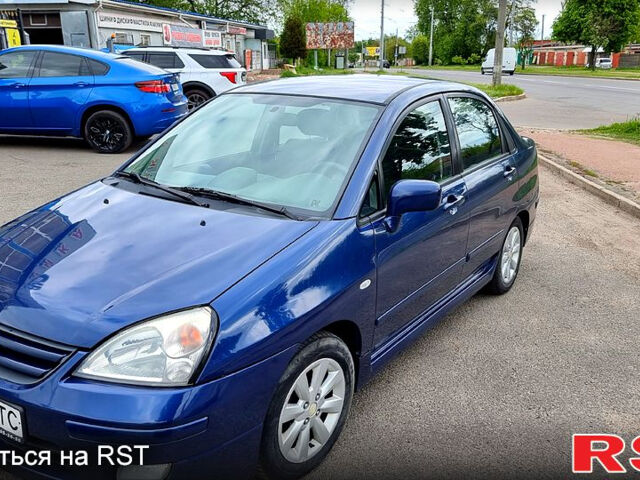 Синий Сузуки Лиана, объемом двигателя 1.6 л и пробегом 250 тыс. км за 4500 $, фото 1 на Automoto.ua