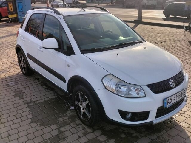 Белый Сузуки СХ4, объемом двигателя 1.6 л и пробегом 115 тыс. км за 7000 $, фото 1 на Automoto.ua